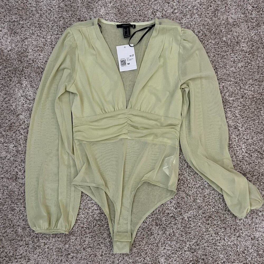 Light green mesh body suit